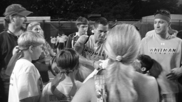 Odesnik, sporting a Whitman Tennis jersey signs autographs after his match. (Photo courtesy of Jasen Gohn.)