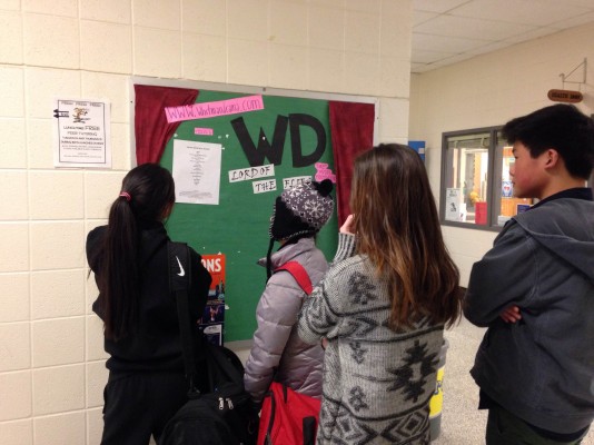 Students view this year's Talent Show set list. Auditions were held Thursday and Monday, and the final list was posted at the end of the day today. Talent Show 2014: An Epic will take place March 27-29. 