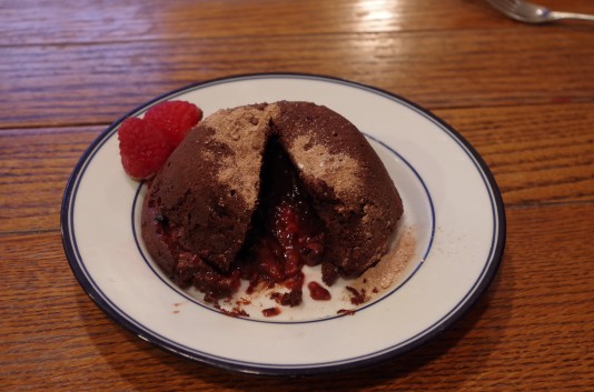 Raspberry lava cakes are a perfect Valentine's Day treat. Whether you're spending the day with a special someone or enjoying a Nicholas Sparks marathon, these decadent cakes are a must for the holiday. Photo by Sarah Barr Engel.