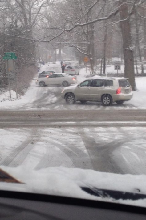 Multiple cars spun-out on Raybrun Rd. during Wednesday morning's snowstorm. Photo courtesy Allison Frank