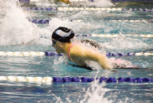 Junior Alli Holm swims the 200 IM, finishing with a time of 2:12:86. Photo courtesy Ginny Maycock. 
