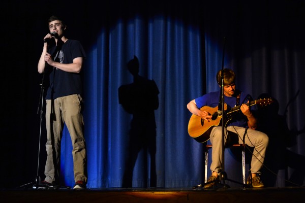 Senior Jordan Bernstein, accompanied by senior Carson Lystad, serenades the audeince for his talent portion of the show. Bernstein made it to the final round of the competition. Photo by Michelle Jarcho.  