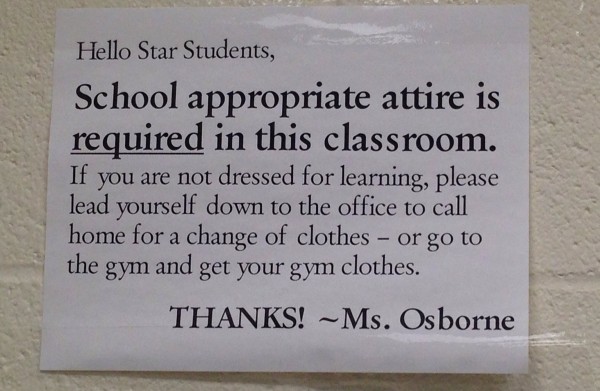 This sign is posted next to social studies teacher Courtney Osborne's door. Photo by Emily Baker.