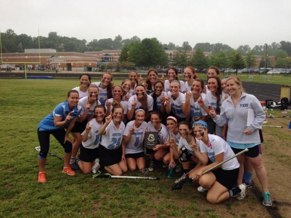 The girls lacrosse team holds up their regional champion plaques after their 16-7 win over Wotton. Photo courtesy Andrew Wetzel.