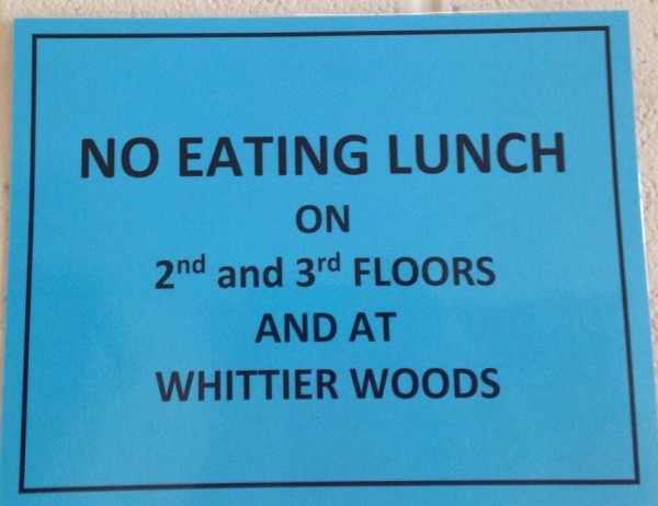 Surely everybody has seen the blue signs plastered all over the school, sheets of paper hung up intermittently every ten feet supposedly telling us to not eat on the second or third hallways during lunch. However, that’s not exactly what they say. Photo by Sebastian van Bastelaer.
