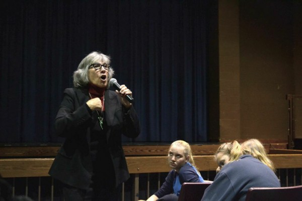 Community educator Cheryl Banks addresses  girls during yesterday's assembly. Banks tried to send a message about empowering women to stand up to sexual assault during her discussion. Photo by Michelle Jarcho.