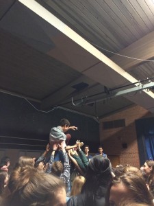 Senior Chris Mason surfs the crowd as the night comes to an end. Photo by Nicole Fleck.