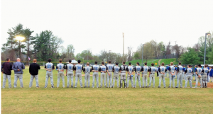The Vikings (4–4) line up before their contest, a 5–2 victory, against the Churchill Bulldogs. Photo by Josh Millin