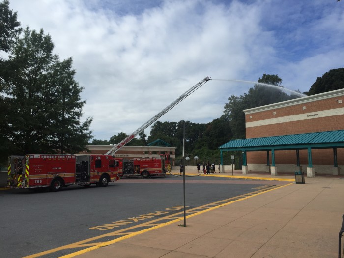 Firefighters perform training at Whitman. Photo by Rachel Friedman.