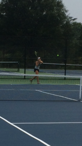 First singles player Carina Greenberg nails a backhand during practice. Photo by Ezra Pine