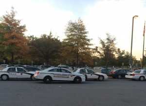 Police cars line up outside the school following a shooting threat on social media. School officials looked into the threat and deemed it safe for school to operate as planned. Photo by Luke Graves. 