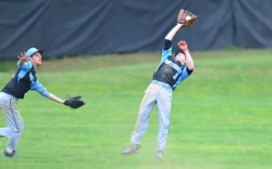 Outfielder Eric Wayman catches the final out of the game. Photo courtesy Whitman baseball.