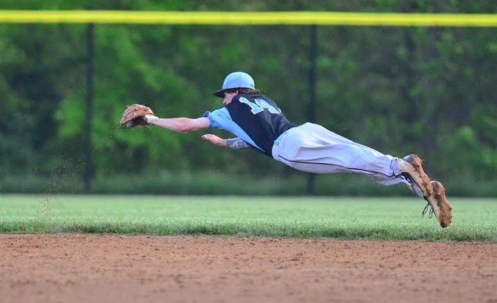 Second baseman Sean Hannegan fully lays out for a ground ball in the fourth inning. Photo courtesy Whitman baseball.