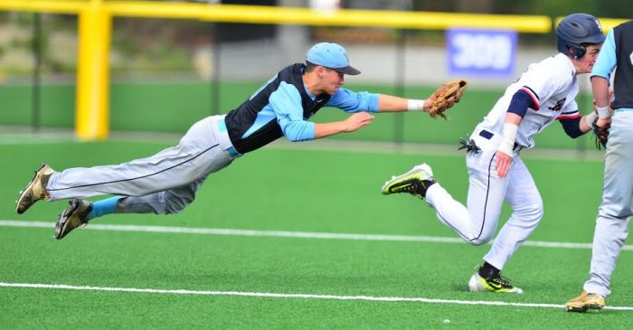 Shortstop Ian Atkinson dives to tag out the St. Albans runner in the fifth inning. Photo courtesy Whitman baseball.