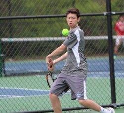 Freshman Jared Lapidus winds up for a strong backhand to his opponent. Photo by Olivia Matthews.