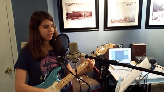 Gurland records a song in her home studio. Photo courtesy Allie Gurland.