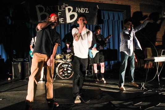 Six senior boys perform "No Sleep Till Brooklyn" by the Beastie Boys, which amped up the crowd at Battle of the Bands Wednesday night. Photo by Tyler Jacobson. 