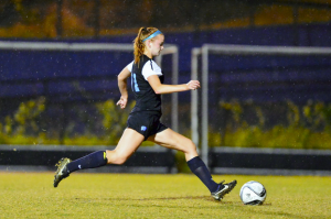 Midfielder Kate Morrison dribbles up the wing before a pass, showcasing her technical abilities. Photo courtesy Adam Prill.