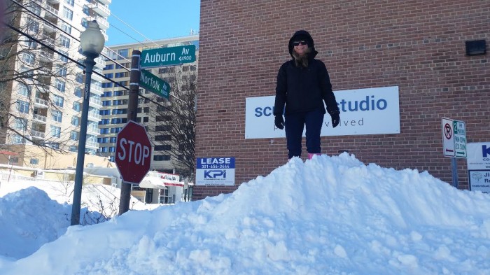 Monica Lun, boys basketball coach Chris Lun's wife, stansd outside in downtown Bethesda. Photo by Chris Lun. 